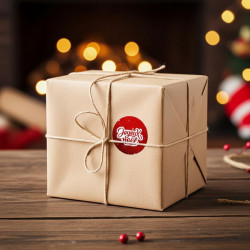 Etiquette Joyeux Noël rouge en rouleau de 1000 ex